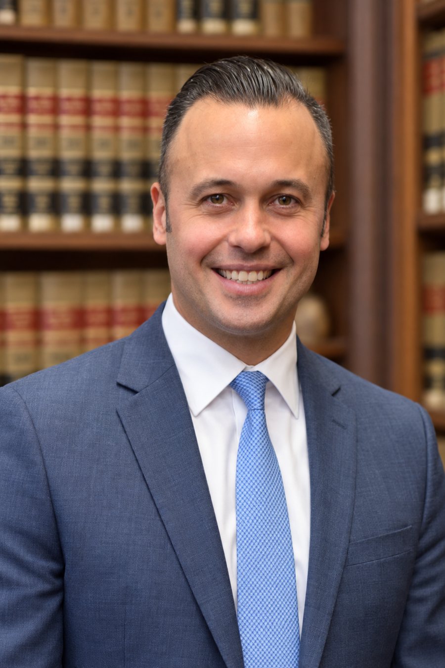 Beau Taylor, Esq. in a law library